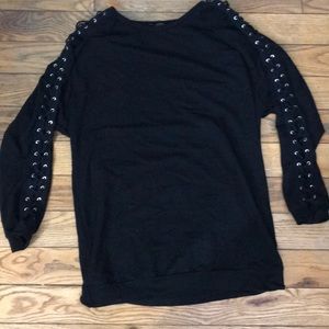 Black long Sleeve. With ties going down the sleeve